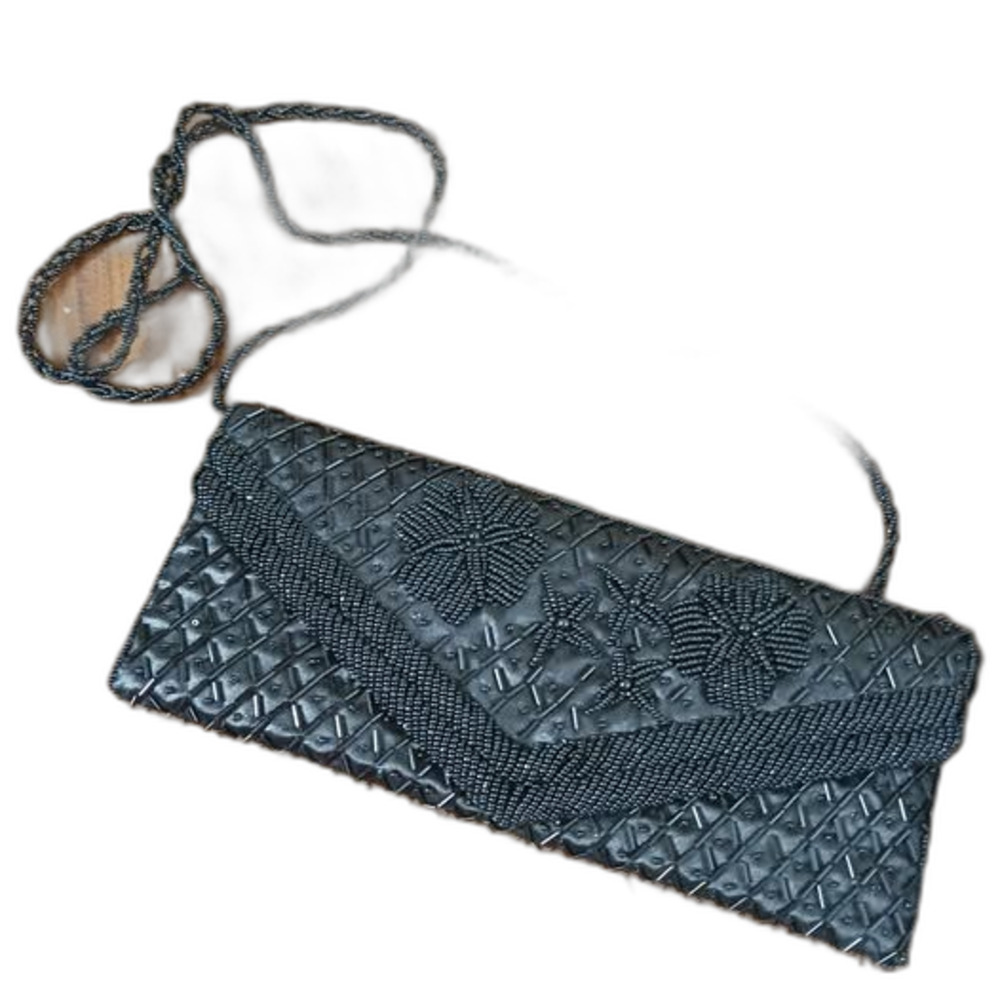 vintage black beaded clutch handbag, produced in the 1950s and 1960s